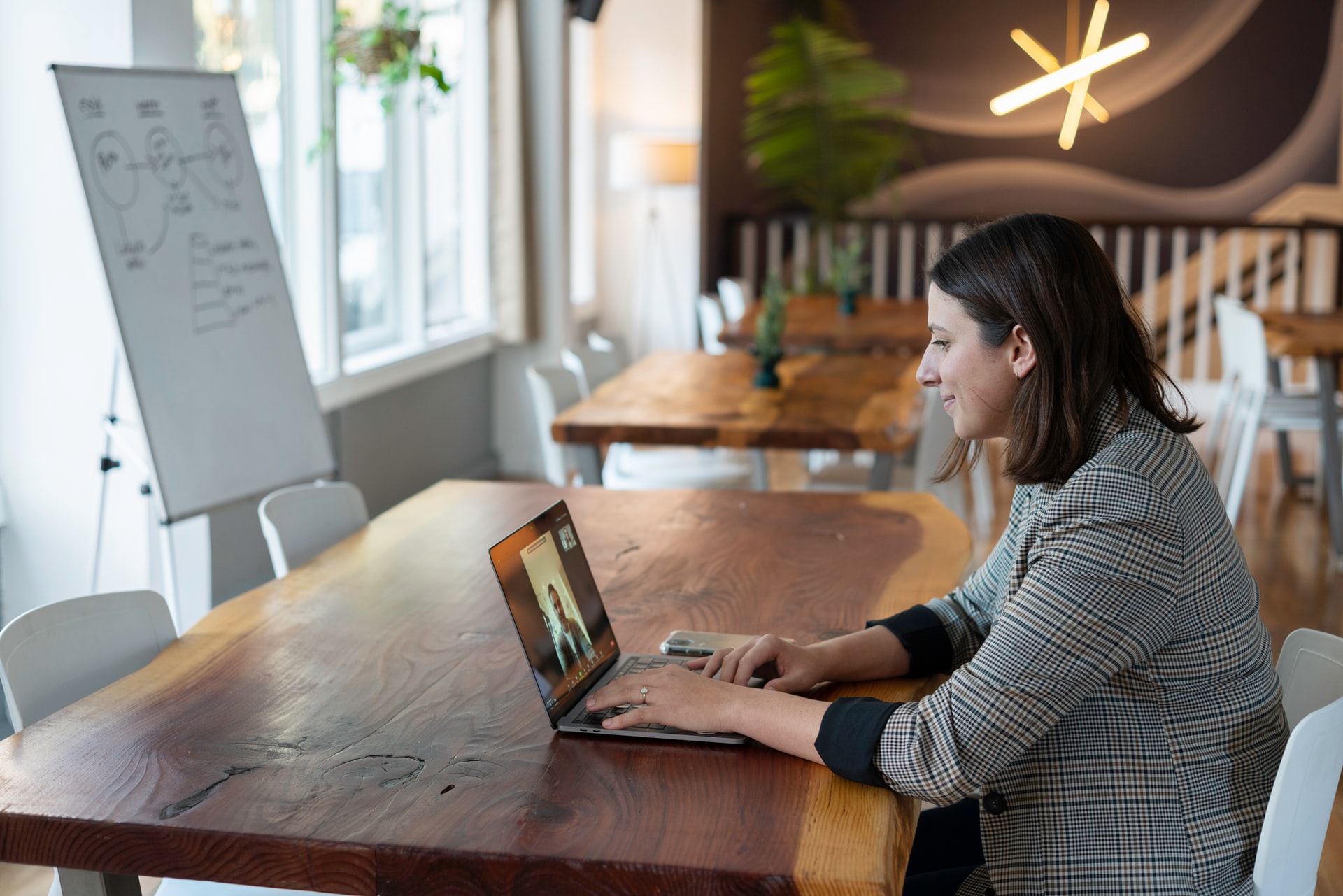 business woman video conferencing on a laptop