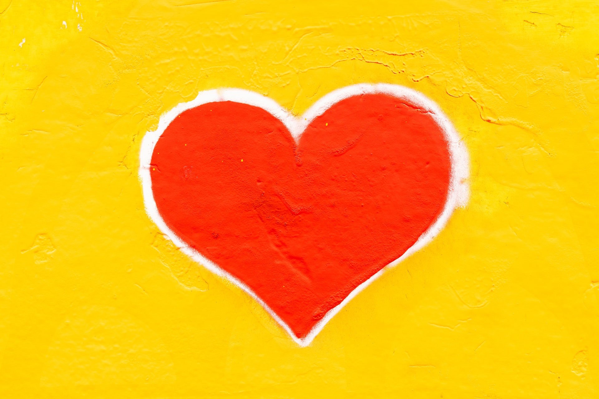 red heart on a yellow background