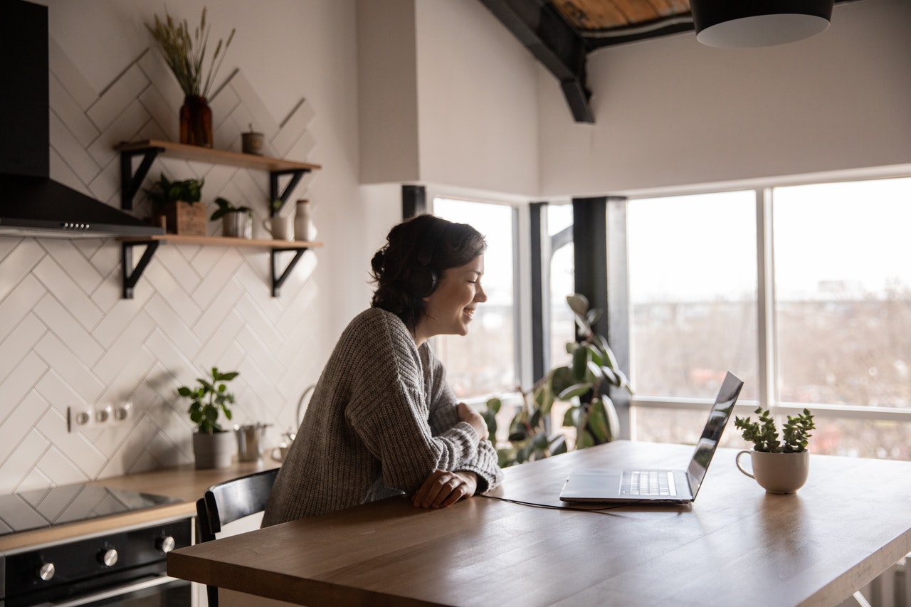 business woman video conferencing on a laptop